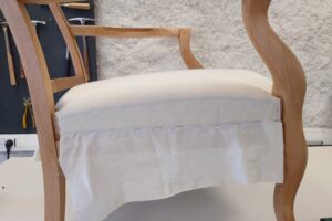 Read more about the article White calico on a seat before final fabric