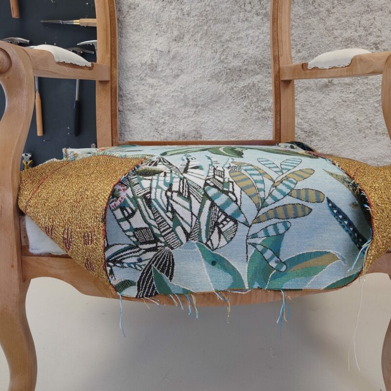 Covering the Seat of an Armchair (Voltaire)