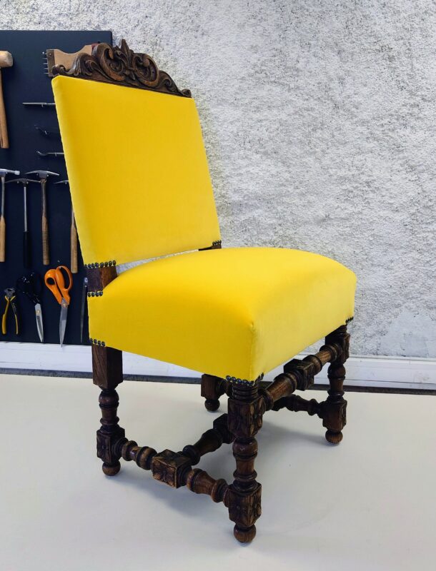 Reupholstered Napoleon III chair after restoration, finished in sunny yellow velvet for a child's bedroom